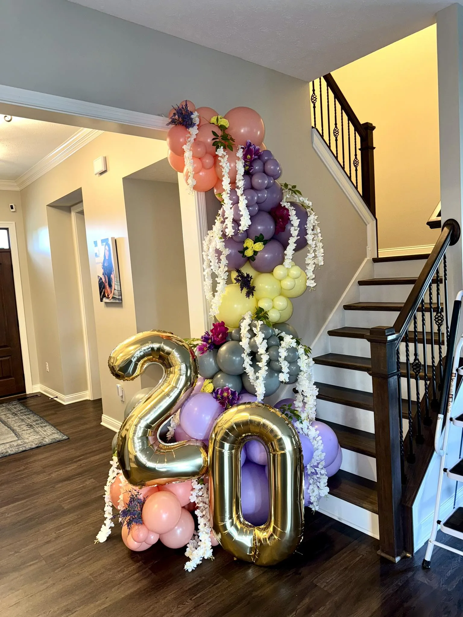 Pastel 20th birthday column with wisteria