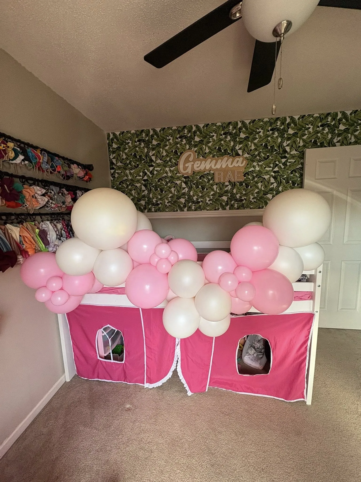 Pink holiday balloon column