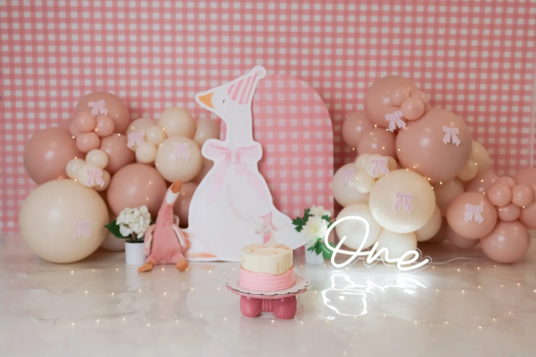 Pink gingham birthday setup